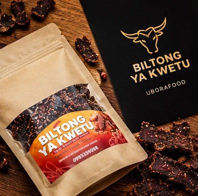 Paquet Biltong ya Kwetu à côté de son coffret noir et or
